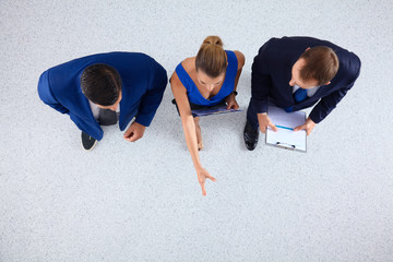 Business people standing together - topview