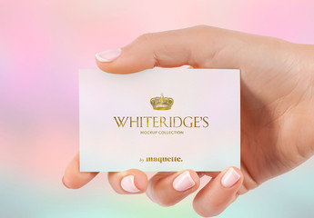 Hand with Gold-Embossed Business Card Mockup 15