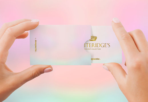 Hand with Gold-Embossed Business Card Mockup 17
