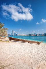 City Abu Dhabi with wooden boats in United Arab Emirates