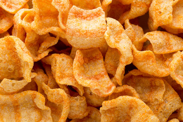 Delicious potato chips closeup becon meat.