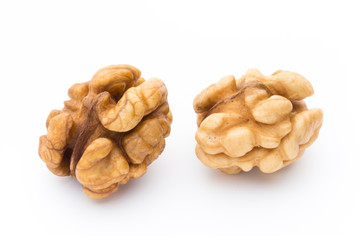 Walnut and walnut kernel isolated on the white background.