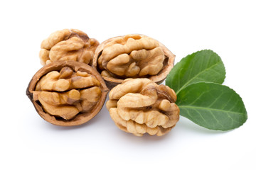 Walnut and walnut kernel isolated on the white background.