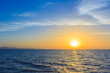 Fototapeta premium Sunrise over the Strait of Gubal