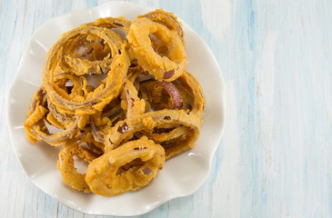 beer battered onion rings close up