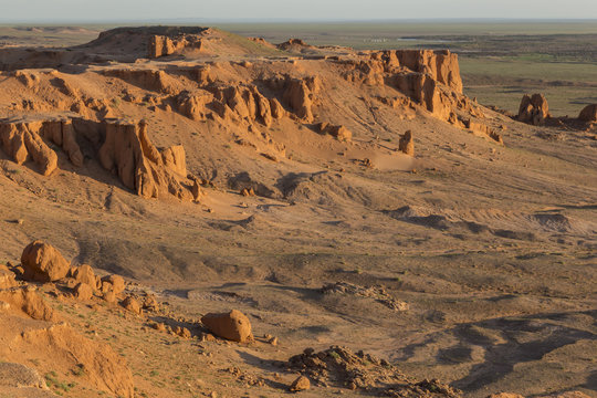 Sunrise, Flaming Cliffs, area of dinosaur bone and egg fossils, Gurvan Saikhan National Park, Bayanzag, Gobi Desert, Mongolia