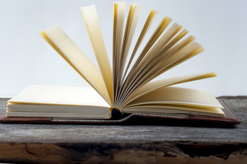 Open book on light table. Back to school. Copy space.