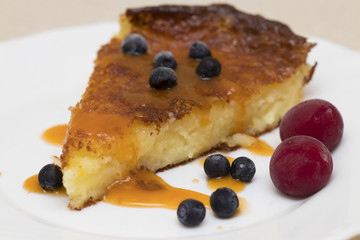 Baked cheese pudding with blueberries