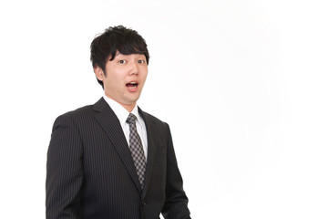 驚いた表情のビジネスマン