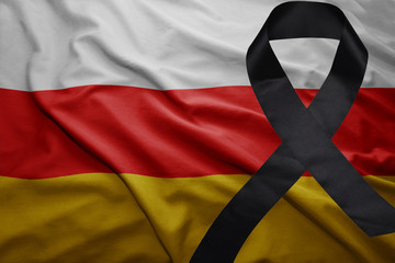 flag of south ossetia with black mourning ribbon