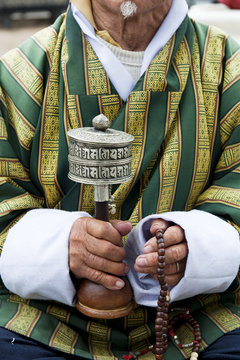 Local Man Holding A Prayer Wheel And Beads, Paro District, Bhutan