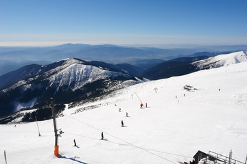 Skiers on the south side of Mount Chopok, Slovakia. © dragunoff