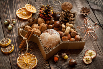 Snacks and decorations for Christmas in a star shaped box