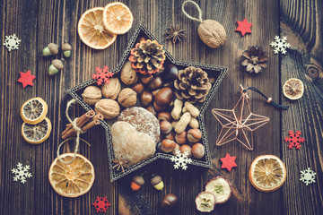Fototapeta na wymiar Snacks and decorations for Christmas in a star shaped box