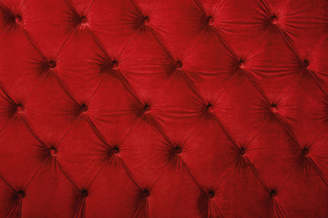 Red capitone tufted fabric upholstery texture