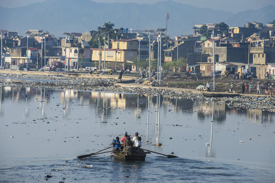 Totally polluted River Mapou flowing through Cap Haitien, Haiti