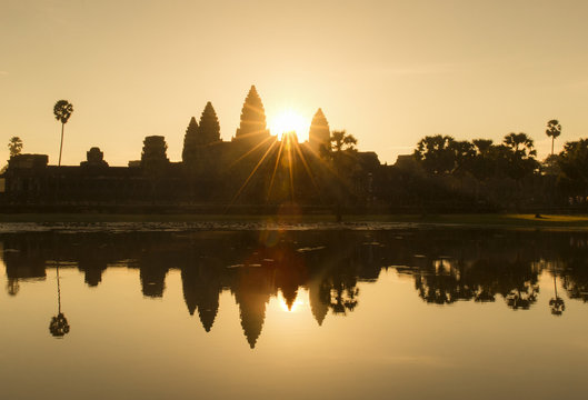 Angkor Wat temple reflected in the lake at sunrise, dawn. UNESCO World Heritage Site, Siem Reap, Cambodia, Indochina, Southeast Asia, Asia