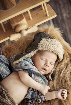 Cute Newborn Baby Dressed As A Pilot