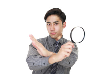 禁止の意思表示をするビジネスマン