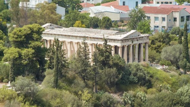 Temple of Hephaestus in Athens Greece Historical Landmark surrounded by Trees seen from the Acropolis Hill