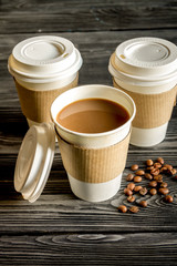 coffee cup take away at wooden background