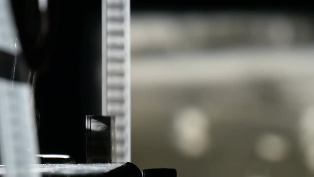 vintage film projector shows film, close-up