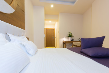 Interior of a new hotel double bed bedroom