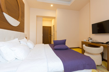 Interior of a new hotel double bed bedroom