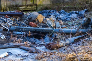 Unlegal dump near forest