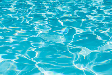 Blue water surface and ripple wave in pool