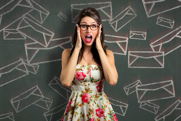 Secretary overwhelmed from too many emails mail bills letters heavy workload 