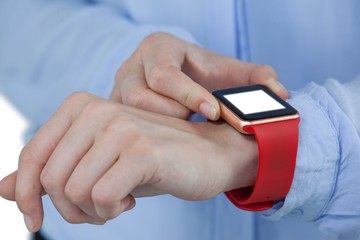 Businesswoman using smartwatch