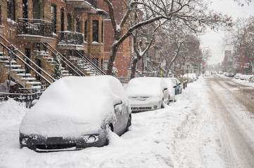 Cars covered in snow during snowstorm in Montreal, December 2016
