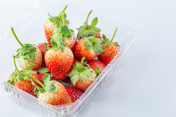 Strawberries in plastic packaging