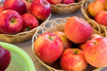 Red apple in basket