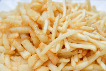fried potatoes on white isolated background