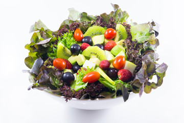 Healthy garden salad in stylish white bowl, isolated on white...