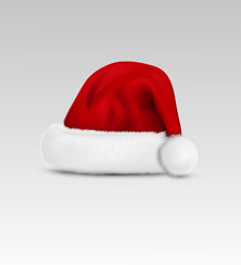 vector object: a red cap of Santa Claus, isolated on a gray back