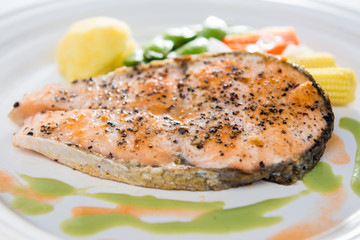 Grilled Salmon with fresh salad . Selective focus..
