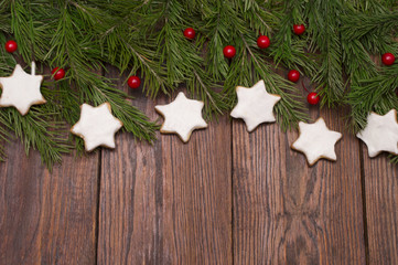 Christmas fir tree on wooden background
