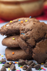 Close up of chocolate chip cookies with sprinkles.