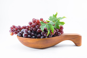 Fresh red grapes isolated on white background...