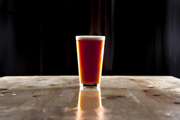 Pint of Red Amber Ale with Empty Space