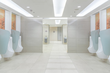 Clean public men toilet in modern international airport for service all passengers