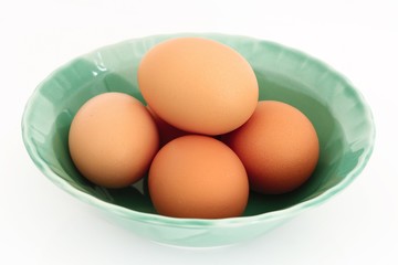 eggs in bowl isolated on white background