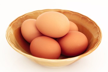 eggs in bowl isolated on white background