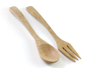 Wooden spoon on white background