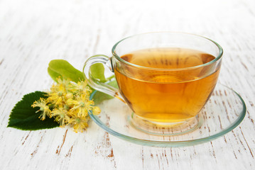 cup of herbal tea with linden flowers