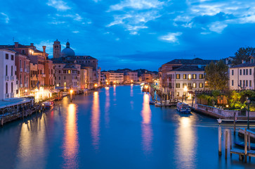 Fototapeta na wymiar Venice (Italy) - The city on the sea in the dusk, from Rialto bridge