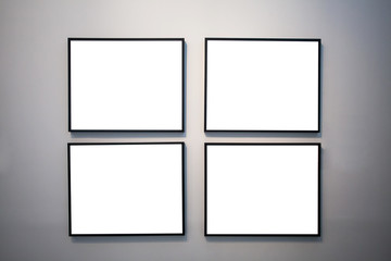 blank photo frame on the wall